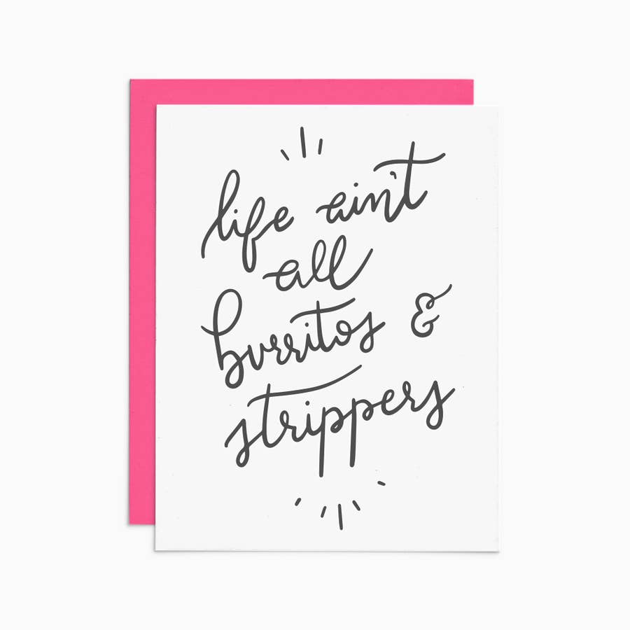Black cursive lettering that reads "life ain't all burritos & stripers" on a white card with a hot pink envelope. 